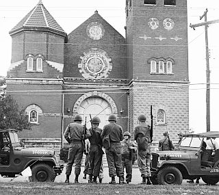 May 22, 1961: National Guard troops in front of the First Baptist Church, Montgomery, AL. AP/Horace Cort.