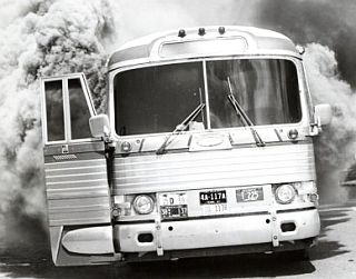 The fire-bombed bus at Anniston, Alabama produced thick smoke that filled the cabin, choking escaping riders.