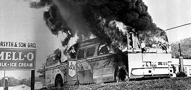 Mothers’ Day, May 14, 1961, as Greyhound bus carrying Freedom Riders and other passengers burns after being fire-bombed by white mob that attacked the bus and some riders near Anniston, Alabama. 