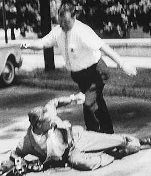 May 20, 1961: Montgomery, AL mob member, later identified as a Klan leader, attacking news photographer.