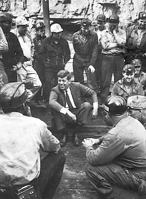 April 1960: JFK meeting with a group of coal miners near Mullens, West Virginia during a shift change while campaigning in Logan County during the West Virginia primary race. 