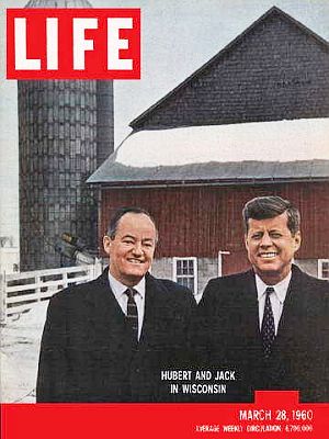 Vying presidential hopefuls in the 1960 Wisconsin Democratic primary, Humphrey & Kennedy, shown on the March 28, 1960 cover of ‘Life’ magazine as they compete for, among other interests, the dairy farm vote. Click for copy.