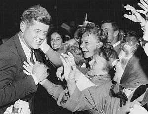 Oct 17, 1960: JFK beset by a group of female admirers at the Dayton, OH airport – Life magazine would call JFK’s rock-star treatment “the adoration phenomenon.” 