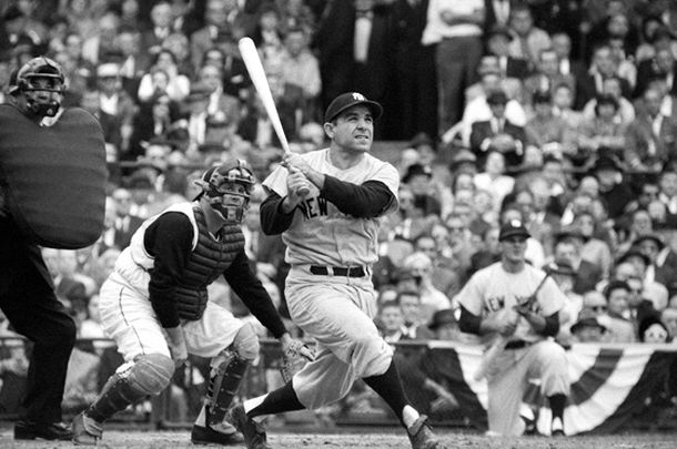 Yogi Berra hitting a 3-run home run for the NY Yankees against the Pittsburgh Pirates at Forbes Field in the 6th inning of Game 7 of the 1960 World Series, giving the Yanks a 5-4 lead. Photo: N. Leifer / Sports Illustrated.