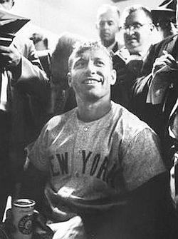 Oct 1960: Mickey Mantle, surrounded by press, celebrates with an Iron City beer in locker room after hitting two home runs in Game 2 of the 1960 World Series. Art Rickerby /Time-Life 