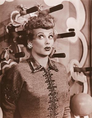 Lucy offering a famous pose during a November 1953 episode of “I Love Lucy” involving knife throwing.