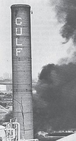 August 17th, 1975: Gulf Oil refinery fire scene near landmark stack, Philadelphia, PA.