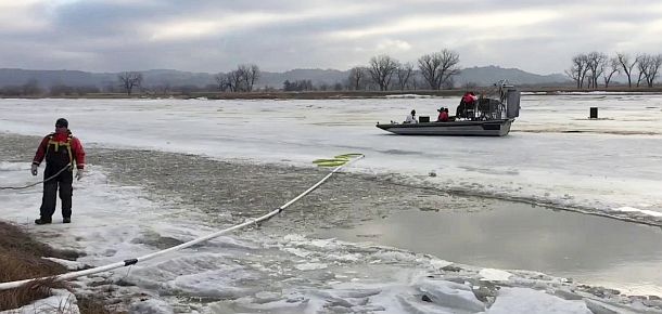 Airboats were being used to transport oil spill response workers on the frozen Yellowstone River following the break of the Poplar Pipeline near Glendive, MT.  Some of the early response shown here.  Photo, Great Falls Tribune. 