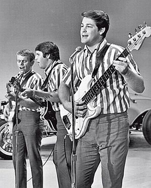 Brian Wilson, right, performing in 1964 with fellow Beach Boys, Carl Wilson and Al Jardine.