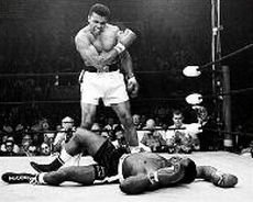 Before title was stripped, Ali in 2nd victory over Sonny Liston, 1965. Click for wall print.