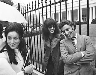 April 24, 1970: Grace Slick & Abbie Hoffman on line at the White House for Tricia Nixon’s Finch College alumni tea. AP Photo/Bob Daugherty