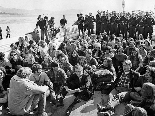 January 29th, 1970: Police move in behind protesters blocking the entrance to the Santa Barbara municipal pier on the first anniversary of the Santa Barbara oil spill. This photo was published in the January 30th, 1970, Los Angeles Times.  Photo, Bruce Cox / Los Angeles Times.