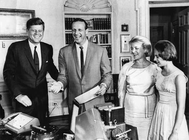 July 12th, 1962: President Kennedy greets St. Louis Cardinal baseball slugger, San Musial and family – wife Lillian and daughter Janet – in the Oval Office during their VIP visit at the White House following the All-Star game.