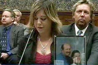 March 2007: Eva Rowe, with portrait of her deceased parents, offering testimony at Congressional hearing on the BP Texas City disaster. Brent Coon is seated behind her at right.