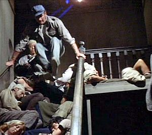 Thorn jumping over local “residents” who now sleep and live in the stairwell outside Thorn & Sol’s apartment.
