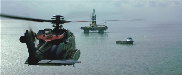 Film clip showing helicopter with about a dozen BP and Transocean passengers aboard, approaching Deepwater Horizon rig.