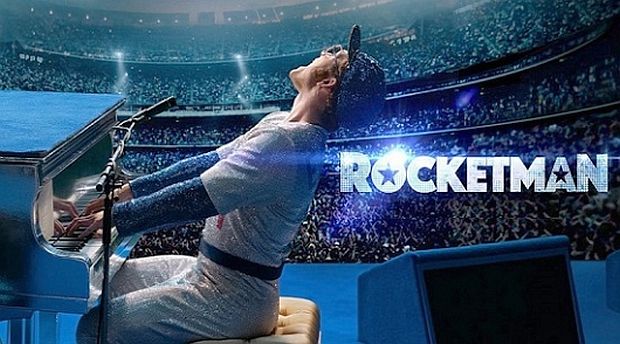 Poster for 2019 film, "Rocketman," about the life and career of British rock star, Elton John, here recreating a scene from a famous October 1975 concert before tens of thousands at Dodger Stadium in Los Angeles. Click for "Rocketman" film DVD.