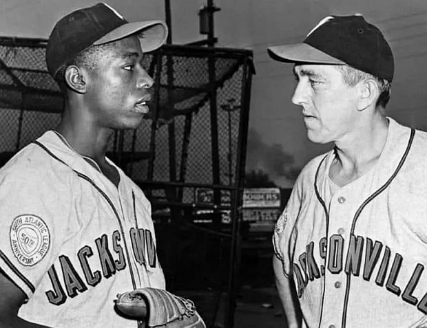 1953 Wire Photo.  Hank Aaron of the Jacksonville Braves, shown with Jacksonville manager, Ben Geraghty. 
