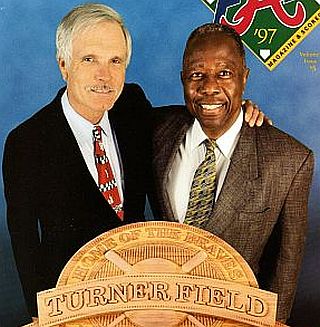 1997 copy of Atlanta Braves fan magazine featuring Ted Tuner and Hank Aaron on cover for opening of Turner Field, with the street address, “755 Hank Aaron Drive”. Click for Turner's story.