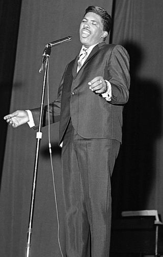 August 3, 1963. Ben E. King performs on stage during Murray The K's Big Holiday Show at the Brooklyn Fox Theater, New York, NY.  (Photo, PoPsie Randolph / Michael Ochs Archives). 
