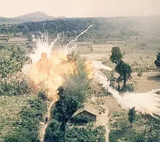 1960s photo of a napalm bombing in South Vietnam, showing its “splash-and-spread” effects. 