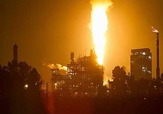 Photo shows earlier flaring at Dow’s Plaquemine, LA plant, July 8, 2012  (Louisiana Environmental Action Network ).