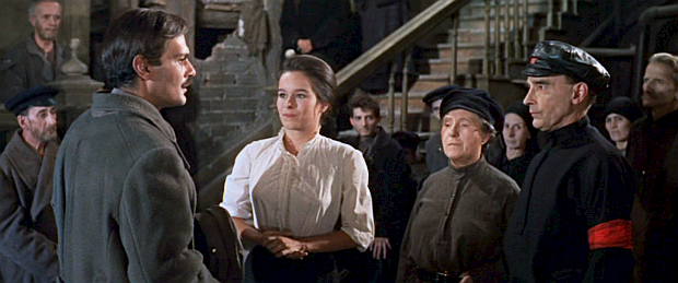 As Yuri enters the once-elegant Gromeko home in Moscow where he was raised, he is introduced to local party officials and learns from Tonya that the home is now divided into units for 13 families.