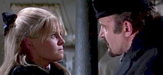 Later, at dress shop, Victor & Lara argue over Pasha, slapping each other, with Victor then forcing himself on Lara.