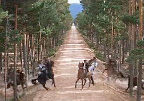 On the road back to Varykino, as he has slowed his horse in thoughts of Lara, Yuri is surrounded by soldiers. 