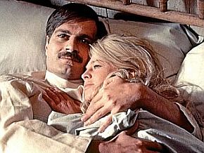 ... and move to Lara’s bedroom where they begin their long-delayed love affair.