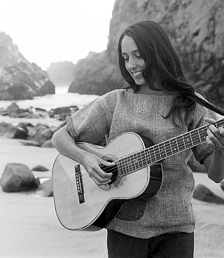 1962. Joan Baez on the rocky coast at Carmel, CA, near her home at the time. Ralph Crane / LIFE Collection.