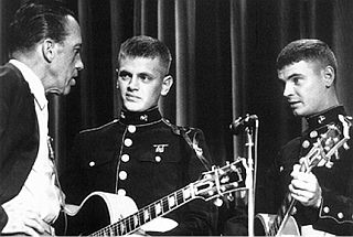 Feb 1962. Everly Brothers on Ed Sullivan Show in their Marine uniforms. 