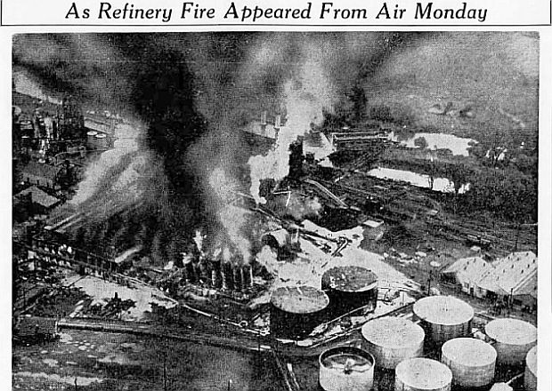 Front-page Associated Press aerial photo of Wellsville refinery fire still burning on Monday, July 18, 1938, as published by The Potter Enterprise (Coudersport, PA). Thursday, Jul 21, 1938 with headline, “As Refinery Fire Appeared From Air Monday.” 