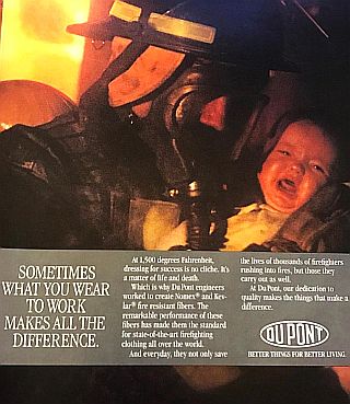 1990 Du Pont ad, plugging Nomex & Kevlar fibers, shows firefighter rescuing a child with headline: “Sometimes What You Wear To Work Makes All The Difference”. 