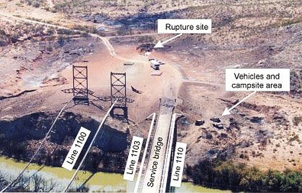 Overview of blast area: the families camping had located between the rupture site and the Pecos River. The two bridge towers at left, each 85 feet tall, also carried pipelines. The effects of the explosion would spread over the entire site.